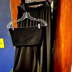 Black two piece bandeau crop top with flowy pants